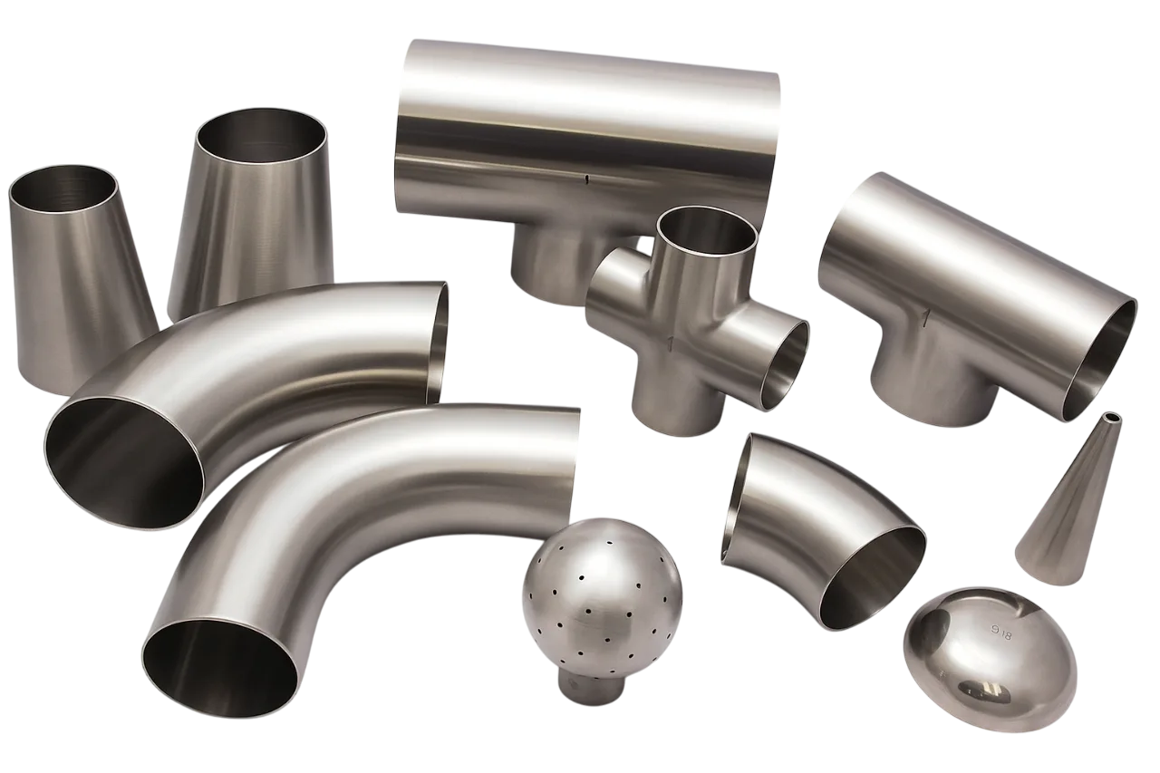 stainless steel pipe fittings including elbows, tees, reducers, and caps used in industrial piping systems in Saudi Arabia.